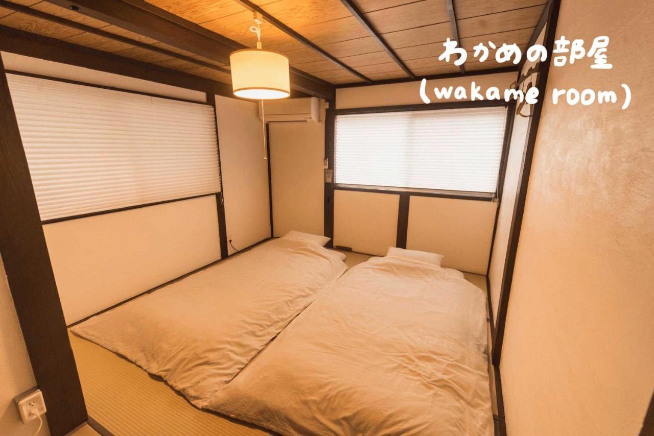 Book & Guesthouse Hitotomaru 丰冈市 外观 照片